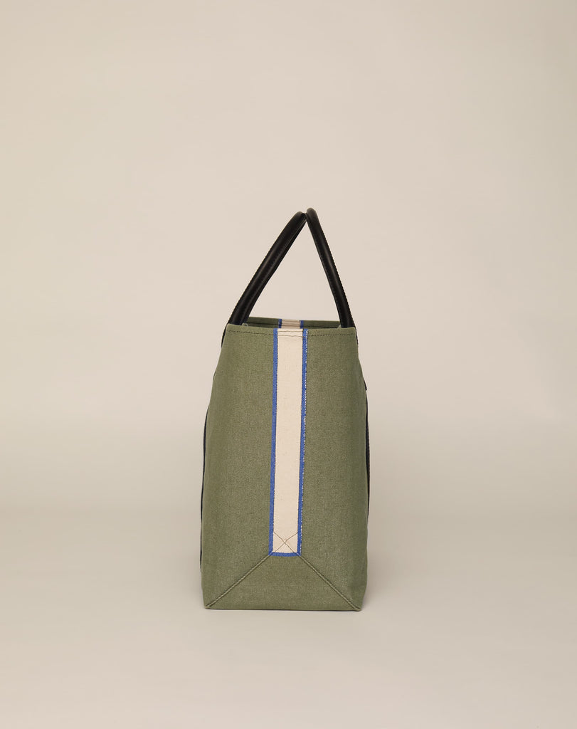 Profile image of classic canvas tote bag in sage colour with black leather handles and contrasting black stripes.