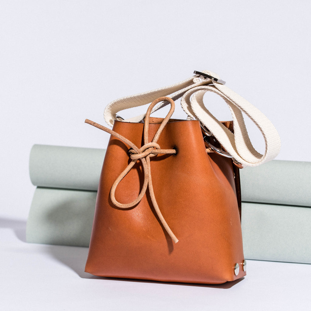 Leather bags with interchangeable straps and handles. One bag. Many stories. Find yours.