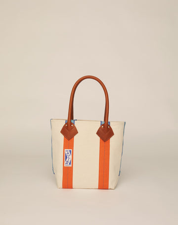 Image of small classic canvas tote bag in natural ecru colour with tan leather handles and contrasting stripes.